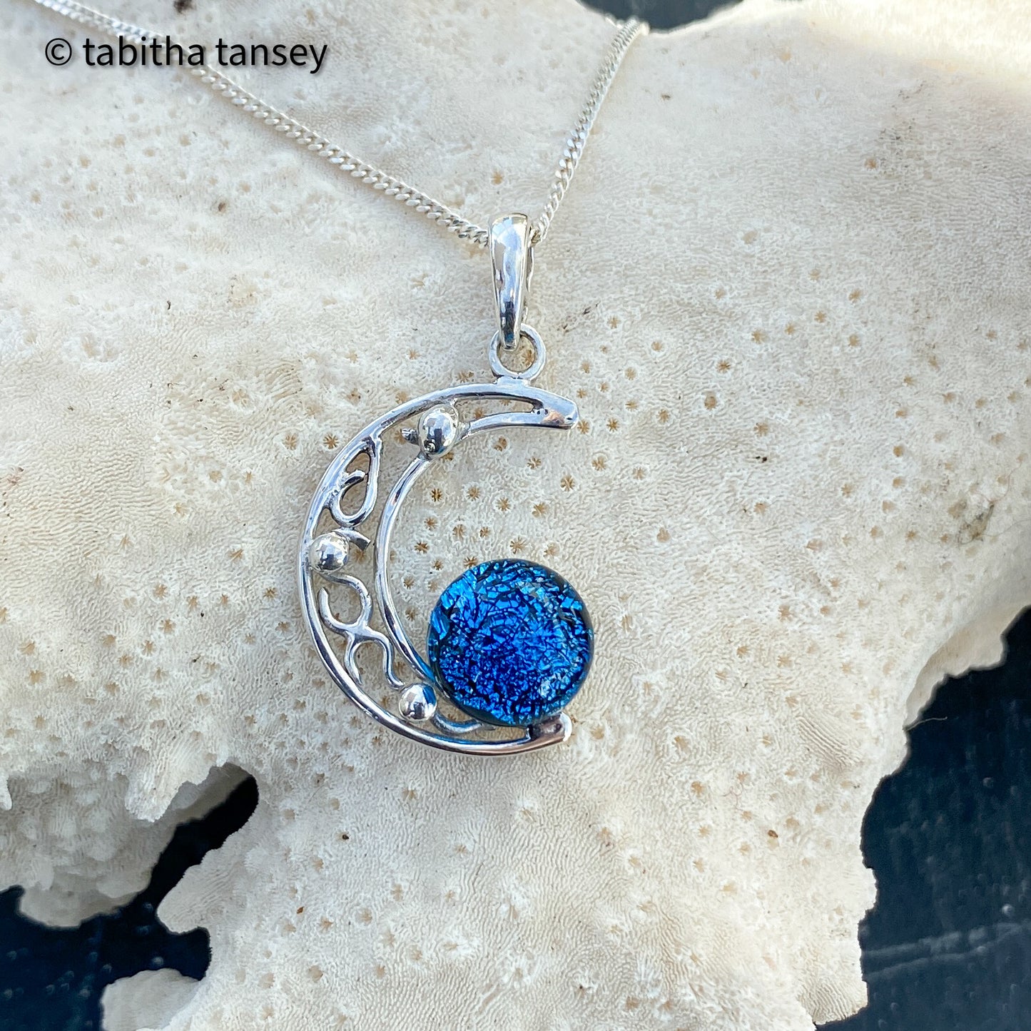 Selection of small Crescent Pendants