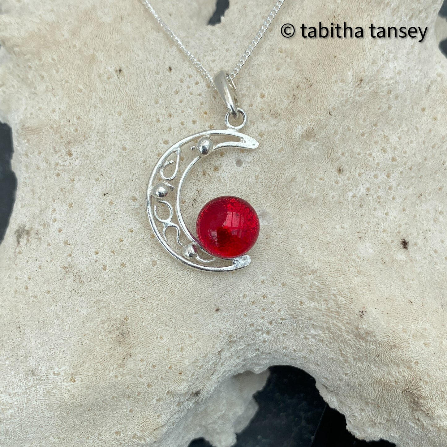 Selection of small Crescent Pendants