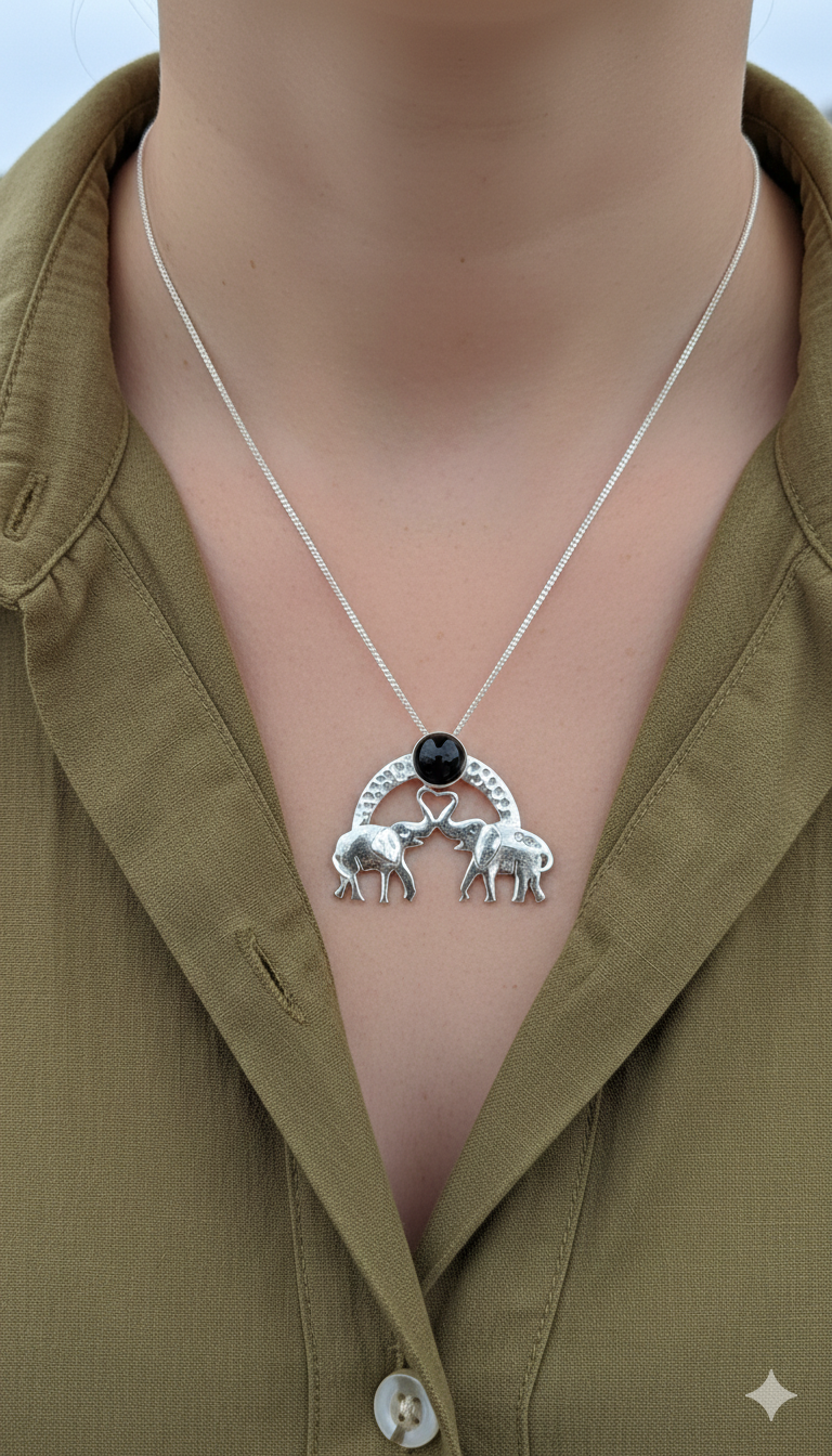 A selection of Double Elephant Pendants