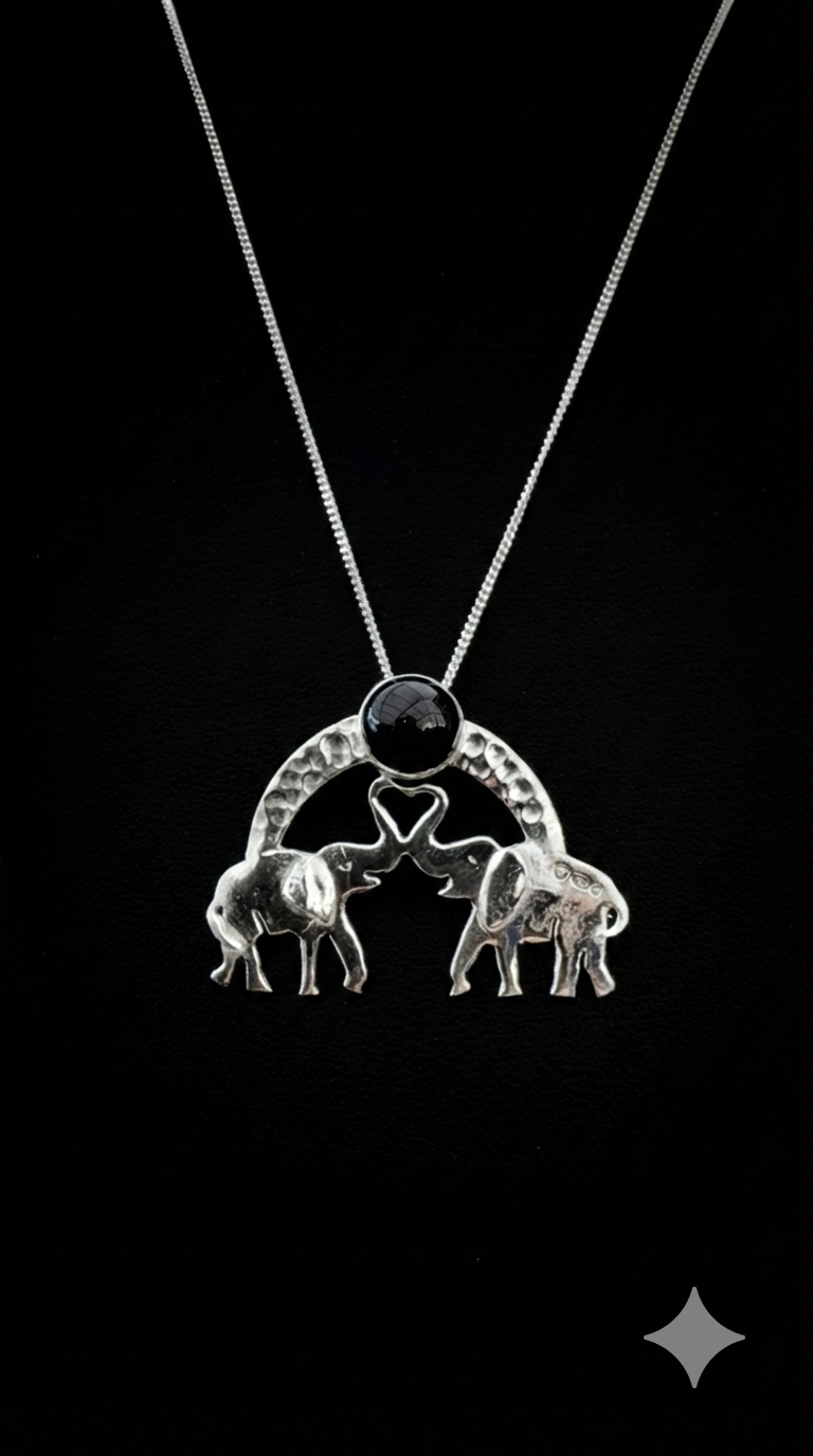 A selection of Double Elephant Pendants